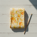 Tangerine Grove hand-painted prosthesis cover sleeve flat lay